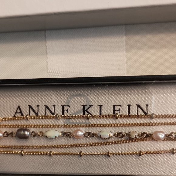 Anne Klein Gold Tone and Iridescent Gemstone Multi-Strand Bracelet and Earrings - Picture 2 of 7